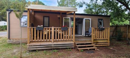 Lit-et-Mixe Other | Mobilhome 6 personnes climatisation, TV, lave-vaisselle, 2 salle de bain, 3 chambres au camping Les Vignes à Lit-et-Mixe dans les Landes avec piscine,