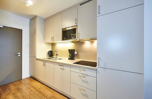 Bensersiel Apartment | Modernes Apartment mit Balkon Inkl. Schwimmbad- & Saunanutzung in Strandnähe