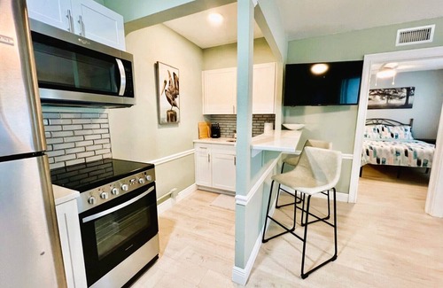 Parrot Cove Apartment | Modern 1 bedroom villa just five minutes to the beach!