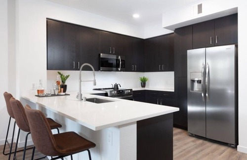 Whisman Station Condo | Modern 1BR Condo with Sparkling Pool and Fitness Center