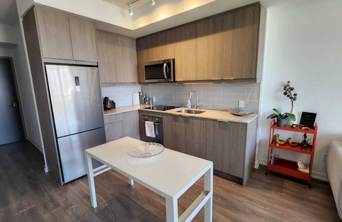 Henry Farm Condo | Modern 2 bed 2 bath Central Hub, mins to TTC and Hwy 401! Family-sized, balcony!