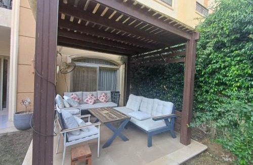 Cairo Apartment | Modern 2BR Apartment with Private Garden Patio, Stone Residence New Cairo