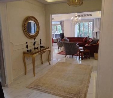Cairo Apartment | Modern 2BR Apartment with Private Garden Patio, Stone Residence New Cairo