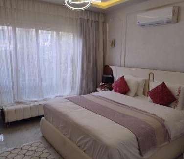 Cairo Apartment | Modern 2BR Apartment with Private Garden Patio, Stone Residence New Cairo