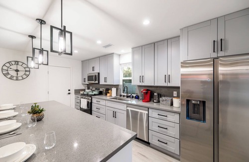 Canoga Park House | Modern 4-bedroom Hollywood Oasis with Claw Machine, Private Spa, and Ping Pong