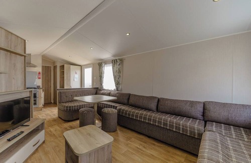Bleadon House | Modern and contemporary 12ft-wide caravan with one double and two twin.