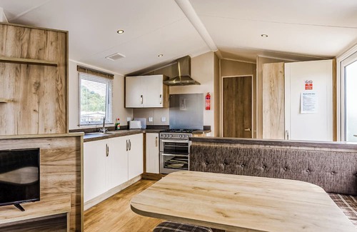 Bleadon House | Modern and contemporary 12ft-wide caravan with one double and two twin.