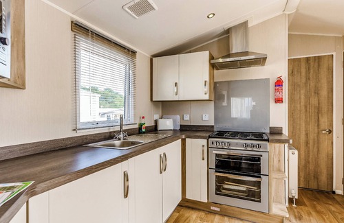 Bleadon House | Modern and contemporary 12ft-wide caravan with one double and one twin.