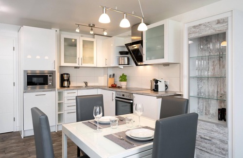 Westerland Apartment | Modern apartment, close to the beach with balcony, parking space, WLAN. Pets allowed.