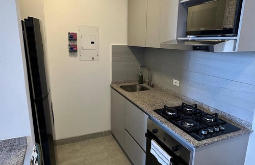 Papare Apartment | Modern Apartment with Pool, Beach Access & Nature Views.