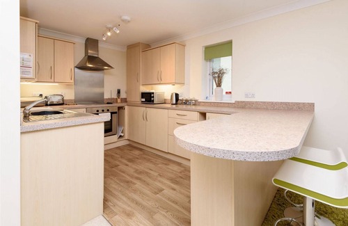 Looe House | Modern apartment with stunning views over Looe harbour.