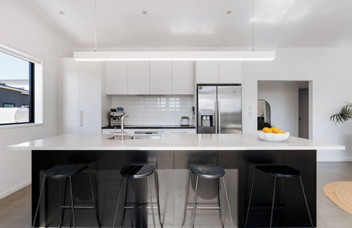 Papamoa Beach House | Modern Beachside Oasis with Private Heated Pool - Pet Friendly!