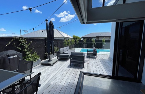 Papamoa Beach House | Modern Beachside Oasis with Private Heated Pool - Pet Friendly!
