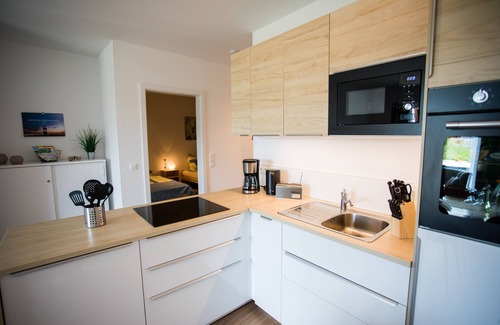 Wremen Apartment | Modern, bright apartment with terrace, directly behind the dike, in the North Sea resort Wremen