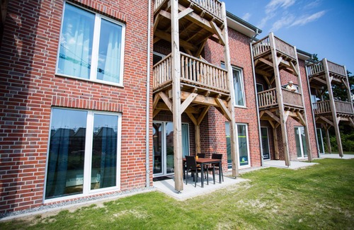 Wremen Apartment | Modern, bright apartment with terrace, directly behind the dike, in the North Sea resort Wremen