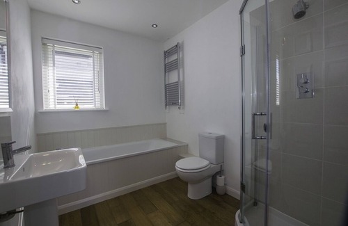 Rhosneigr House | Modern Bungalow, Pet Friendly, With Private, Enclosed, South Facing Garden