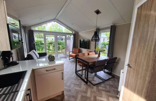 Municipality of Epe Apartment | Modern chalet retreat with spacious garden in the Veluwe.