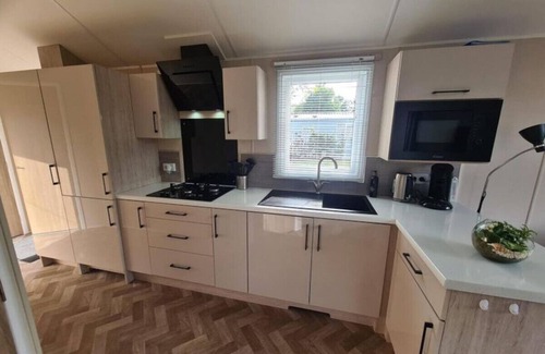 Municipality of Epe Apartment | Modern chalet retreat with spacious garden in the Veluwe.