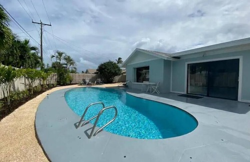 Indian Harbour Beach House | Modern coastal home w/heated pool & pet friendly