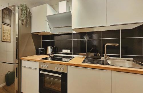 Korntal-Munchigan Apartment | Modern & Comfortable Business Apartment Stuttgart - WLAN, 4K TV, Küche, Waschmaschine, Balkon