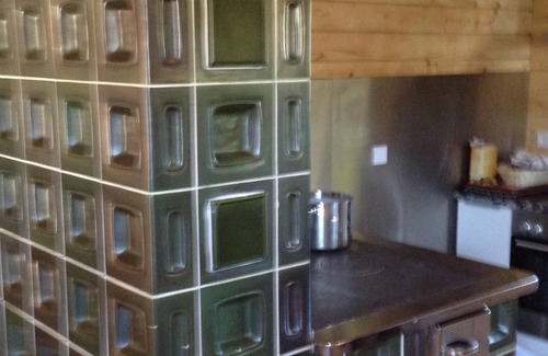 Turracher Hohe House | Modern comfortable spacious mountain chalet with wellness area and tiled stove