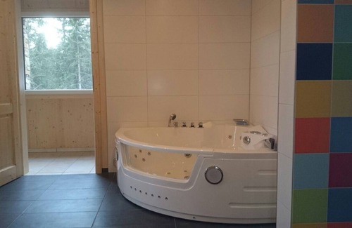 Turracher Hohe House | Modern comfortable spacious mountain chalet with wellness area and tiled stove