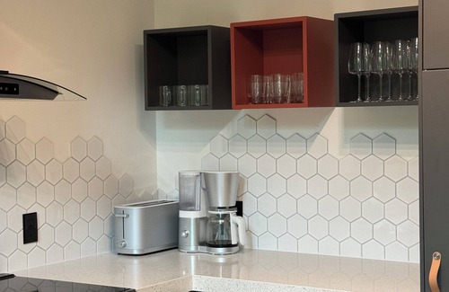 Novar Cottage | Modern Cottage in Muskoka. Sauna, hot tub, lake water access and kids room.