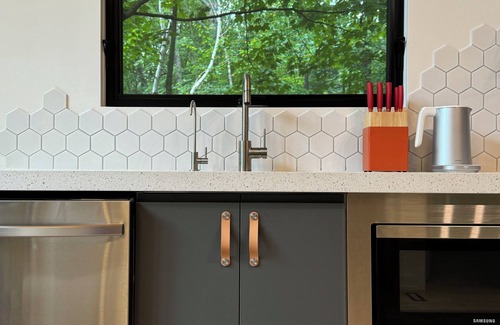 Novar Cottage | Modern Cottage in Muskoka. Sauna, hot tub, lake water access and kids room.