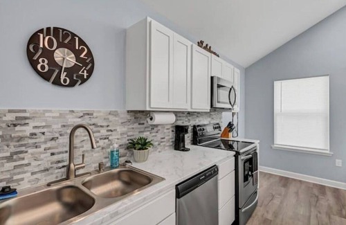 Morrilton House | Modern Couples Retreat . Lakefront . Private Dock