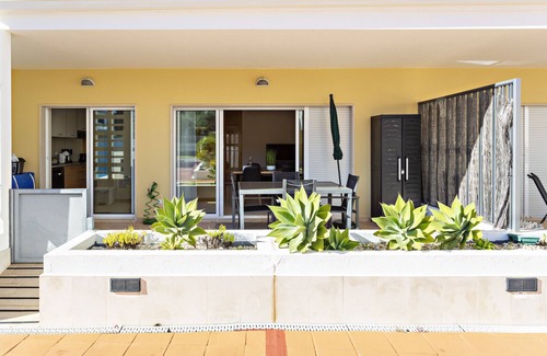 Cabanas Apartment | Modern, cozy apt with pool access