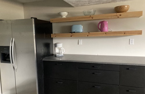 Sandy House | Modern daylight basement apartment close to mountains