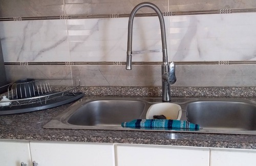 Luxor Apartment | Modern, fully furnished one bedroom Apartment with a supermarket on-site.