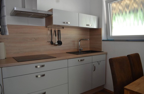 Wangerland Apartment | Modern, ground-floor apartment with garden, ideal for young families.
