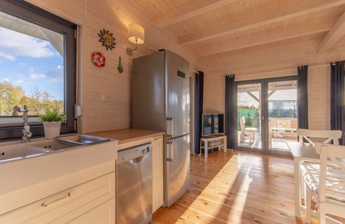 gmina Wolin House | Modern house CORNELLO with garden next to lagoon