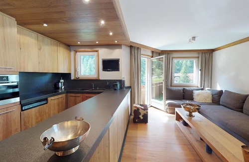 St. Moritz Apartment | Modern in alpine style designed apartment with tasteful details