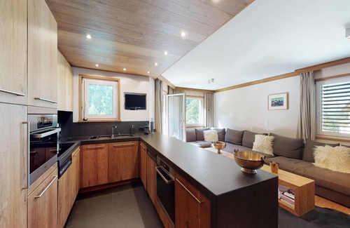 St. Moritz Apartment | Modern in alpine style designed apartment with tasteful details