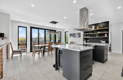 Chertsey House | Modern Lakefront Chalet + Private Jacuzzi & Dock