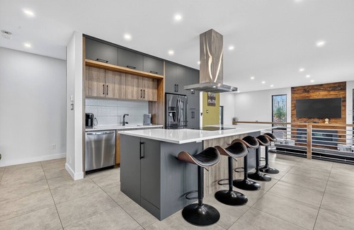 Chertsey House | Modern Lakefront Chalet + Private Jacuzzi & Dock