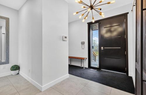 Chertsey Ski Chalet | Modern Lakefront Chalet Private Jacuzzi Dock