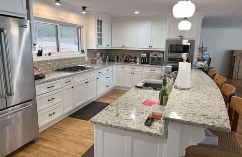 Flowery Branch House | Modern Lakefront Oasis Unwind in Comfort & Style