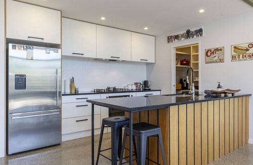 Wharewaka House | Modern Luxury Escape | Stylish Hideaway with Lake Views & Gourmet Kitchen