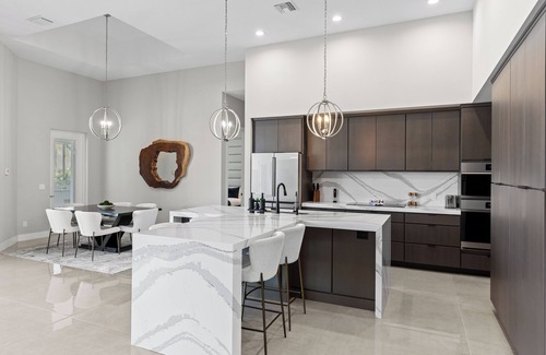 Cape Coral Villa | Modern Luxury Gulf-Access Retreat - Heated Pool & Spa -Sleeps 9