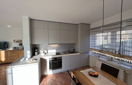 Borkum House | Modern, luxury holiday home with a large garden and terrace near the beach.