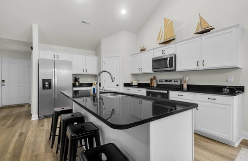 Oriental House | Modern NC Home: Dock, Karaoke, Games, Fire Pit