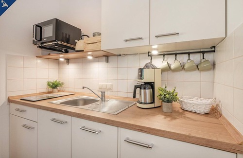 Garz Apartment | Modern semi-detached house with terrace and garden furniture