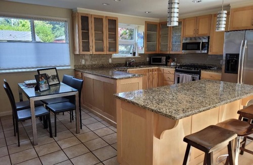 Haller Lake House | Modern, spacious five bedroom home on quiet street