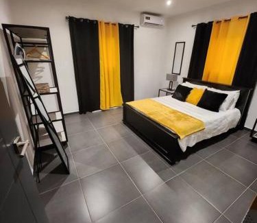 Tera Kora Apartment | Modern sunshine yellow apartment with nature views