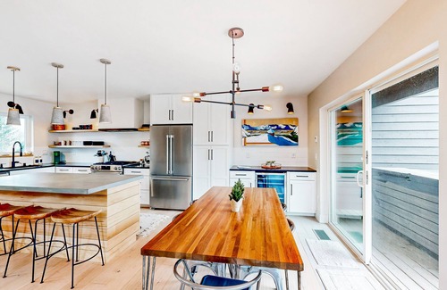Alyeska Condo | Modern townhouse with private hot tub, mountain views, & natural light