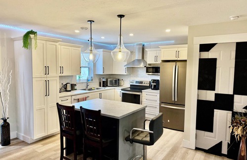 Dieppe House | Modern Vac Home, Private Hot Tub, Close to Airport