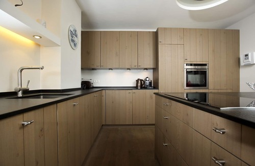 Westerland Apartment | Modern vacation apartment with large roof terrace and private sauna in Westerland
